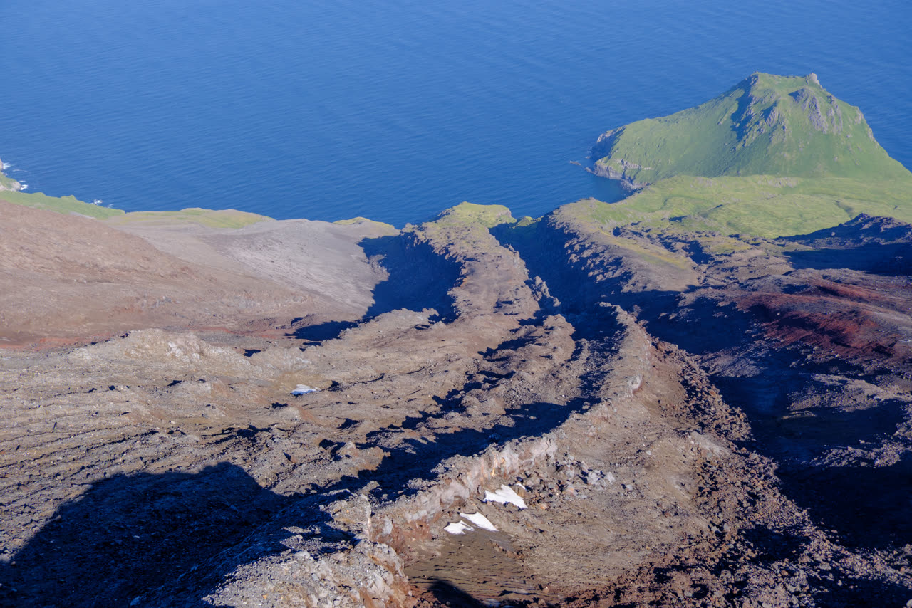 Reference photo of an older lava flow on Great Sitkin's north flank, September 1, 2023; not current conditions.